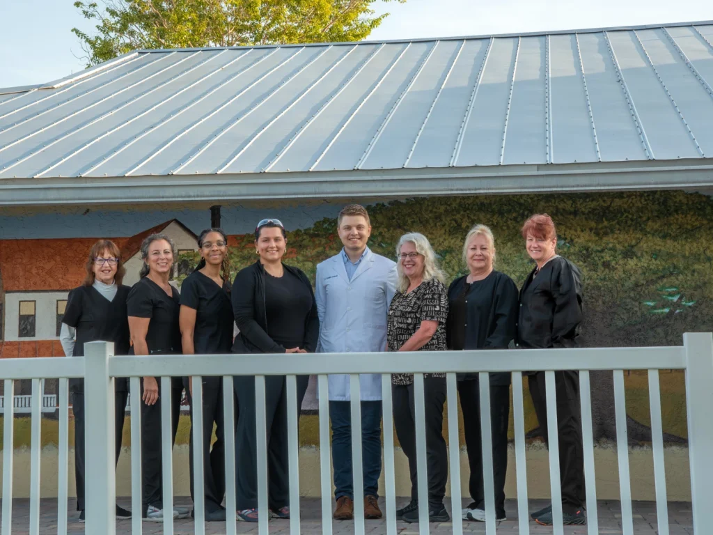 Group photo of the team at Dolecki Advanced Dentistry and Implants | Locally-owned dentist in Punta Gorda, FL